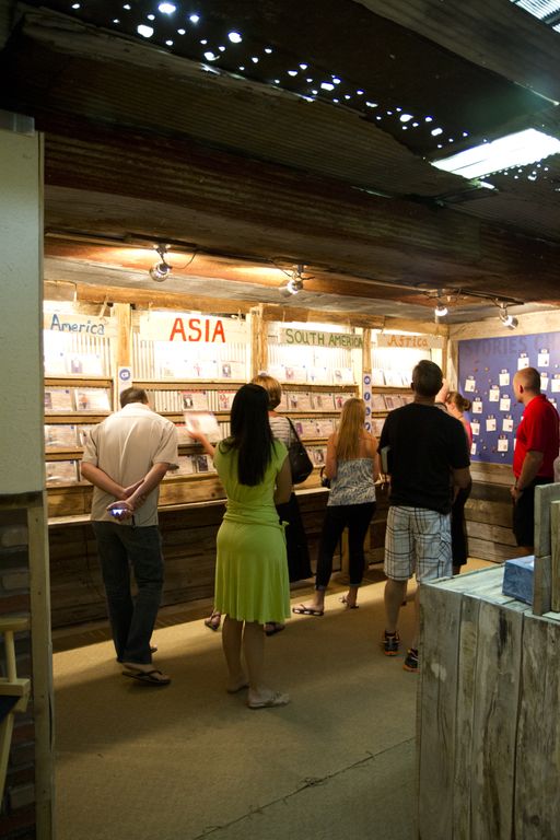 people looking at displays in a mobile trailer