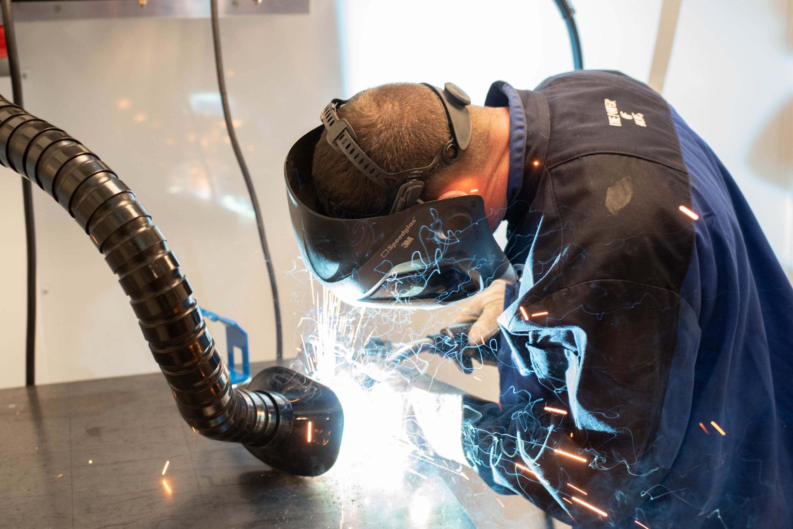 First Institute Welding Action inside of the mobile trailer