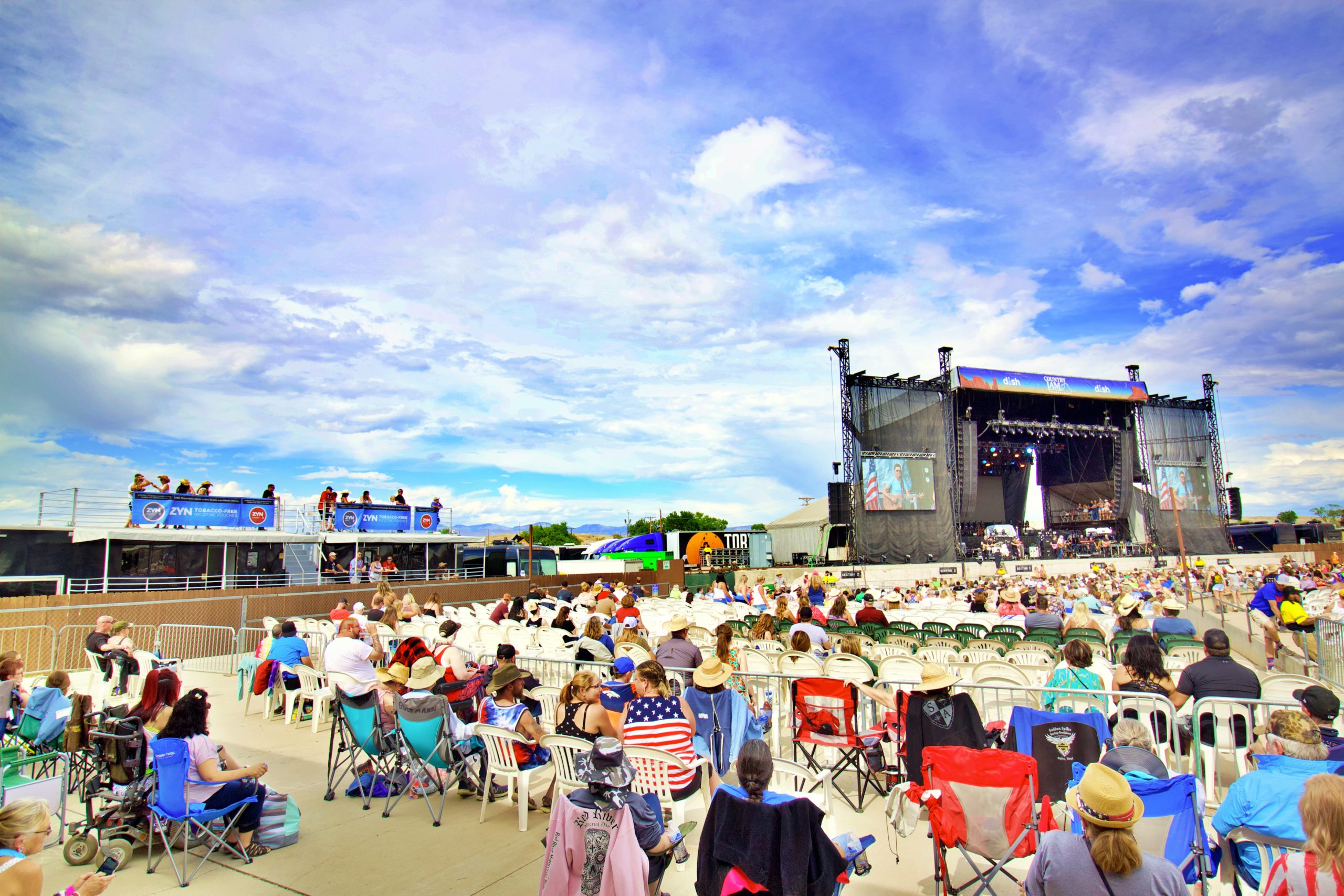 People gathered in front of a stage