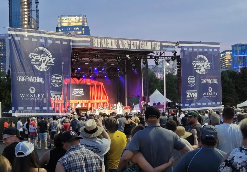 Huge crowd watching the main stage at Music City Grand Prix